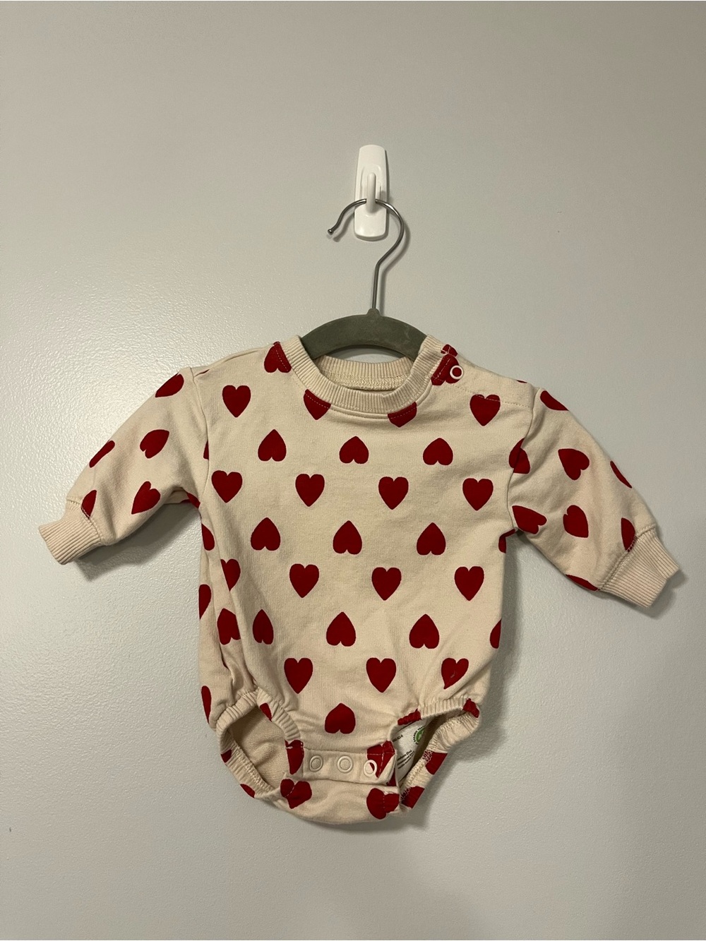 Carter's Cream One-Piece with Red Heart Pattern